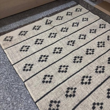 Lichtgrijs jute vloerkleed van wol