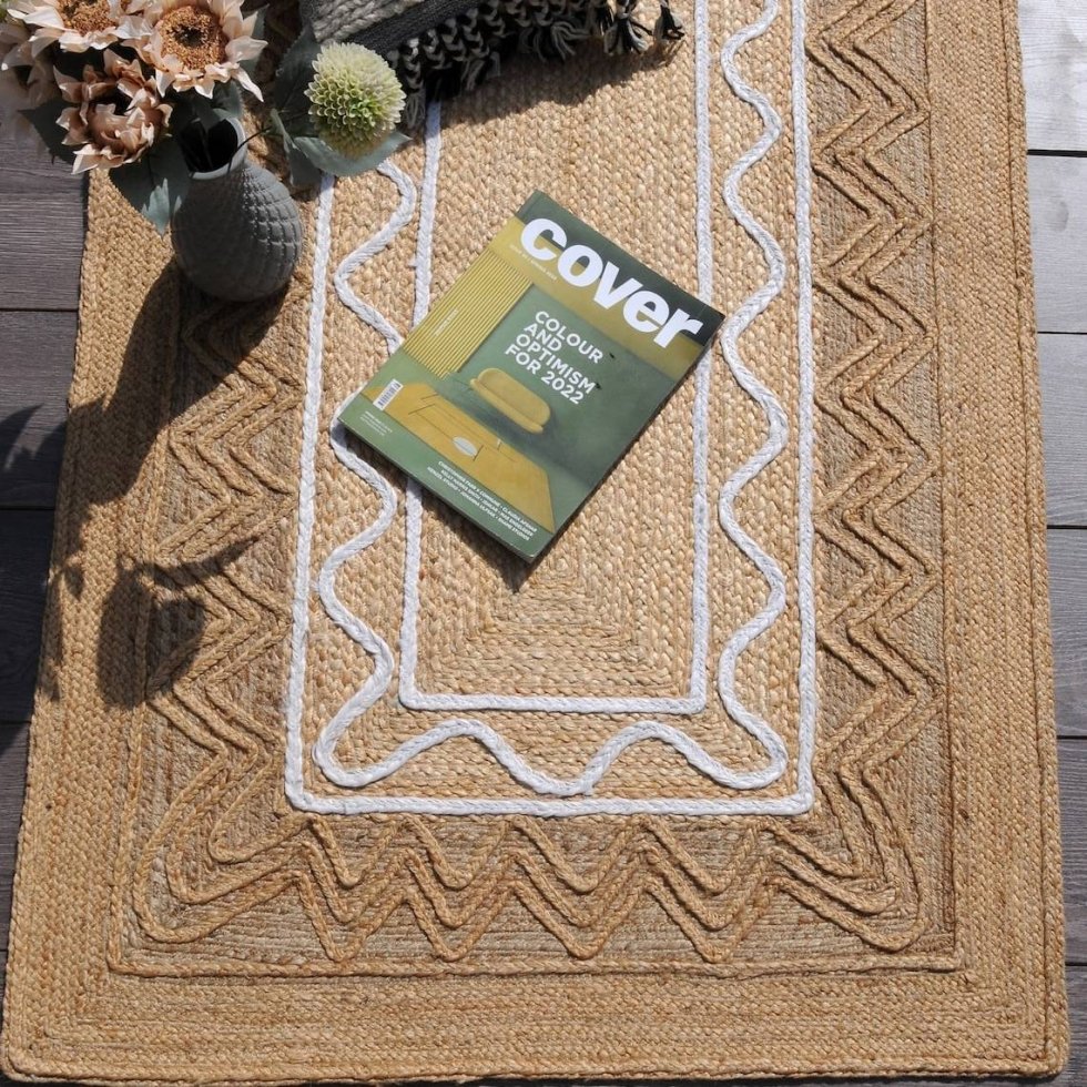 Vloerkleed van gevlochten jute met natuurlijke textuur
