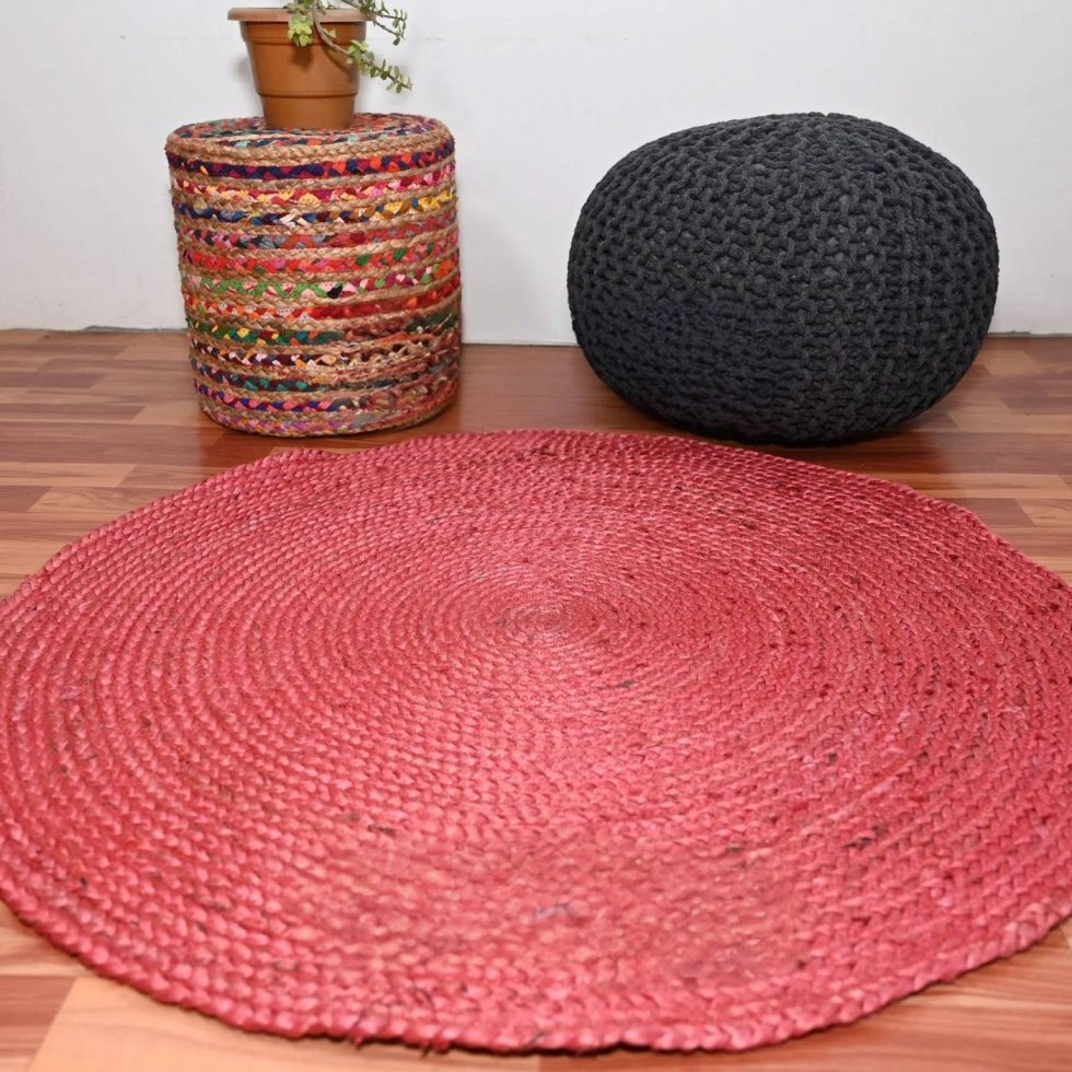 Roze gevlochten rond jute vloerkleed
