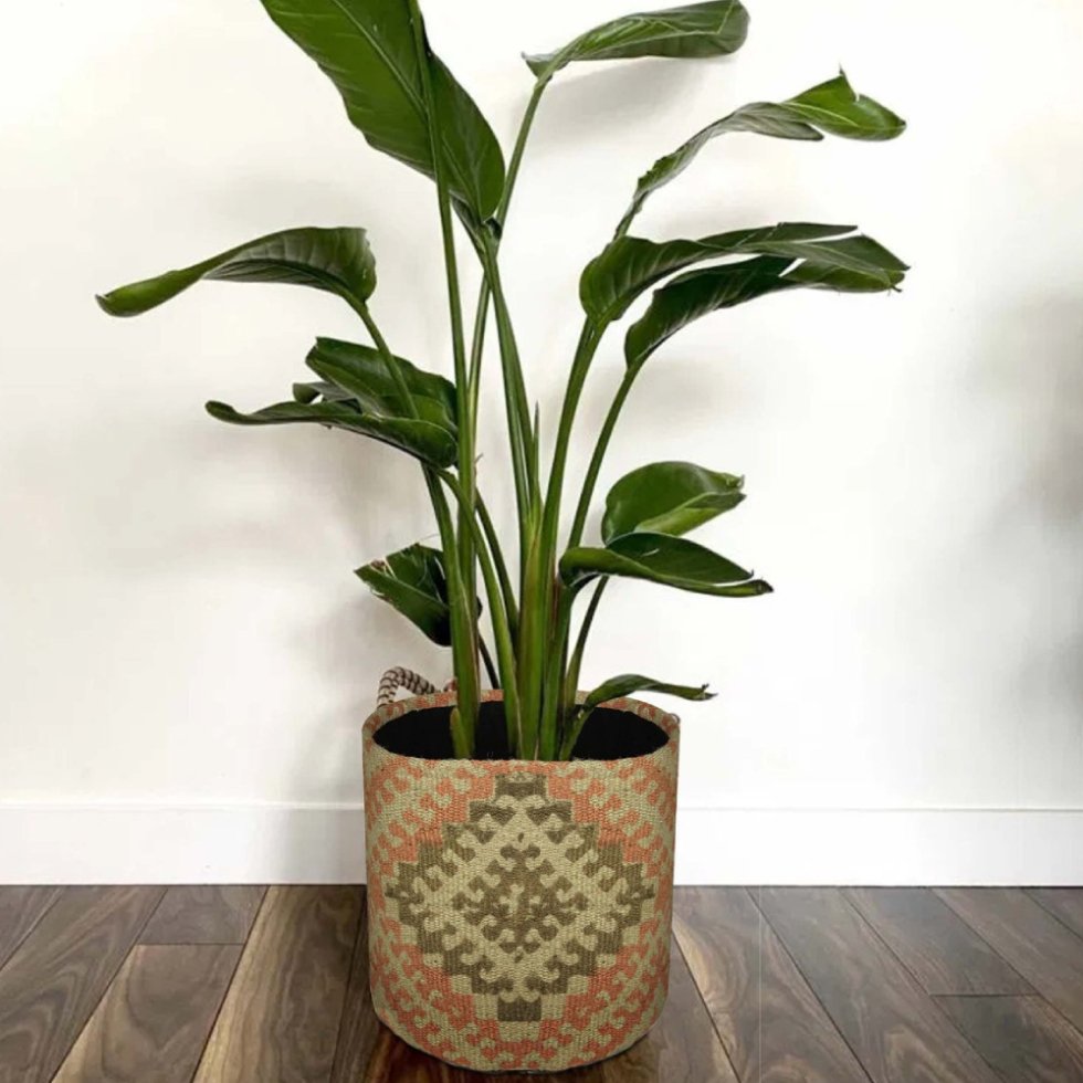 Tribal jute kilim basket for plant