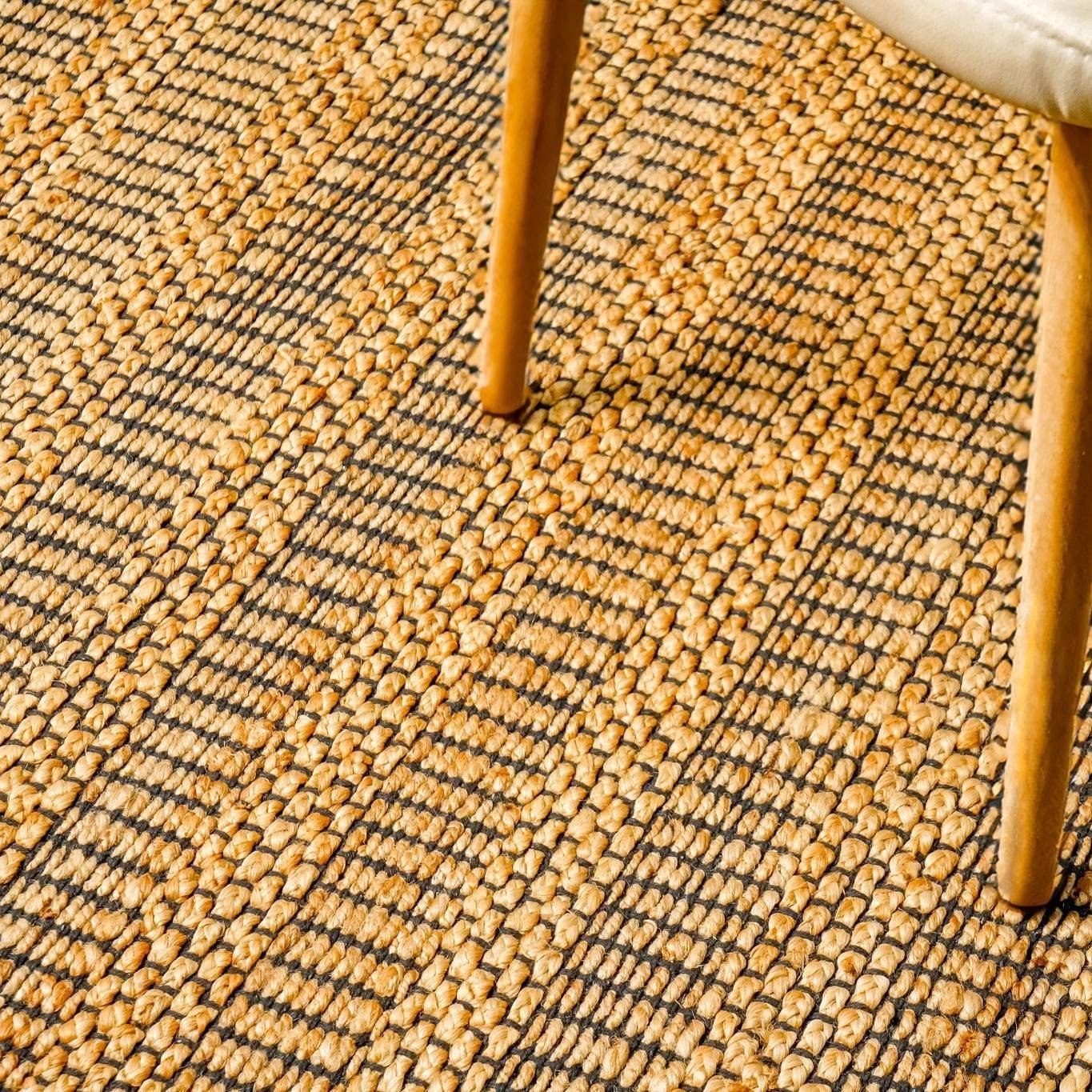 Geel katoenen en jute vloerkleed Geel katoenen en jute vloerkleed